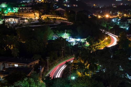 Night shot of blurred car lights in Jamaica